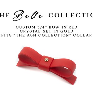 May include: Red silicone bow, 3/4 inch, with gold crystal.  The Belle Collection.  Custom-made accessory designed to fit The Ash Collection collar.  Elegant and sophisticated jewelry detail.