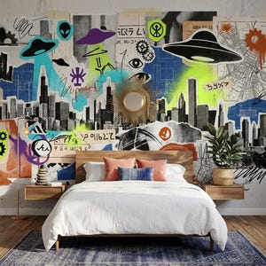May include: A bedroom with a white bed, wooden headboard, and nightstands. The wall behind the bed features a collage of images, including a cityscape, UFOs, and graffiti art. A blue rug and decorative pillows complete the room.
