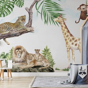 May include: A watercolor illustration of a jungle scene with a leopard, lion, giraffe, monkey, and leafy plants. The illustration is printed on a white wall in a child's room.