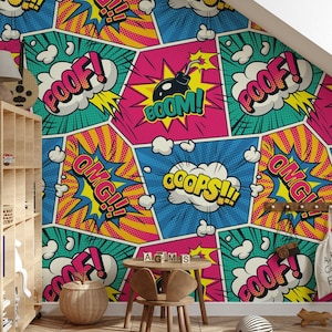 May include: A colorful comic book style wallpaper with words like "POOF!" and "BOOM!" in bright yellow, red, and blue. The wallpaper is in a child's room with a small wooden table and chair.
