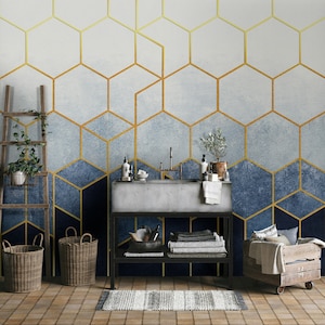 Papier peint abstrait géométrique d'hexagones sur un fond bleu avec des éléments d'aspect doré Stickers muraux
