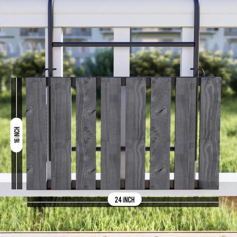May include: A gray wooden planter with a black metal frame, measuring 24 inches wide and 16 inches high. The planter is hanging from a black metal hook.