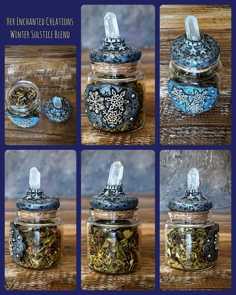 May include: A small glass jar with a cork lid and a crystal top. The jar is filled with dried herbs and has a blue and silver snowflake design on the side. The jar is labeled "Her Enchanted Creations Winter Solstice Blend".