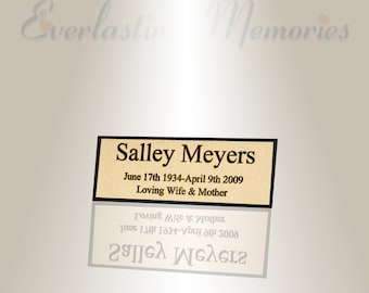 Puede incluir: Una placa dorada con letras negras que dice "Salley Meyers, June 17th 1934-April 9th 2009, Loving Wife & Mother".
