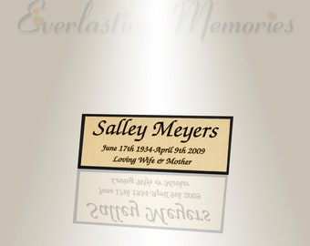 Puede incluir: Una placa dorada con letras negras que dice "Salley Meyers, June 17th 1934-April 9th 2009, Loving Wife & Mother".