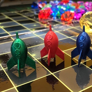 Space Rocket Figures - Set of 4 Colors for Motivational Reward, Crafts or Glow Doodle 101 Game Pieces (Genuine)