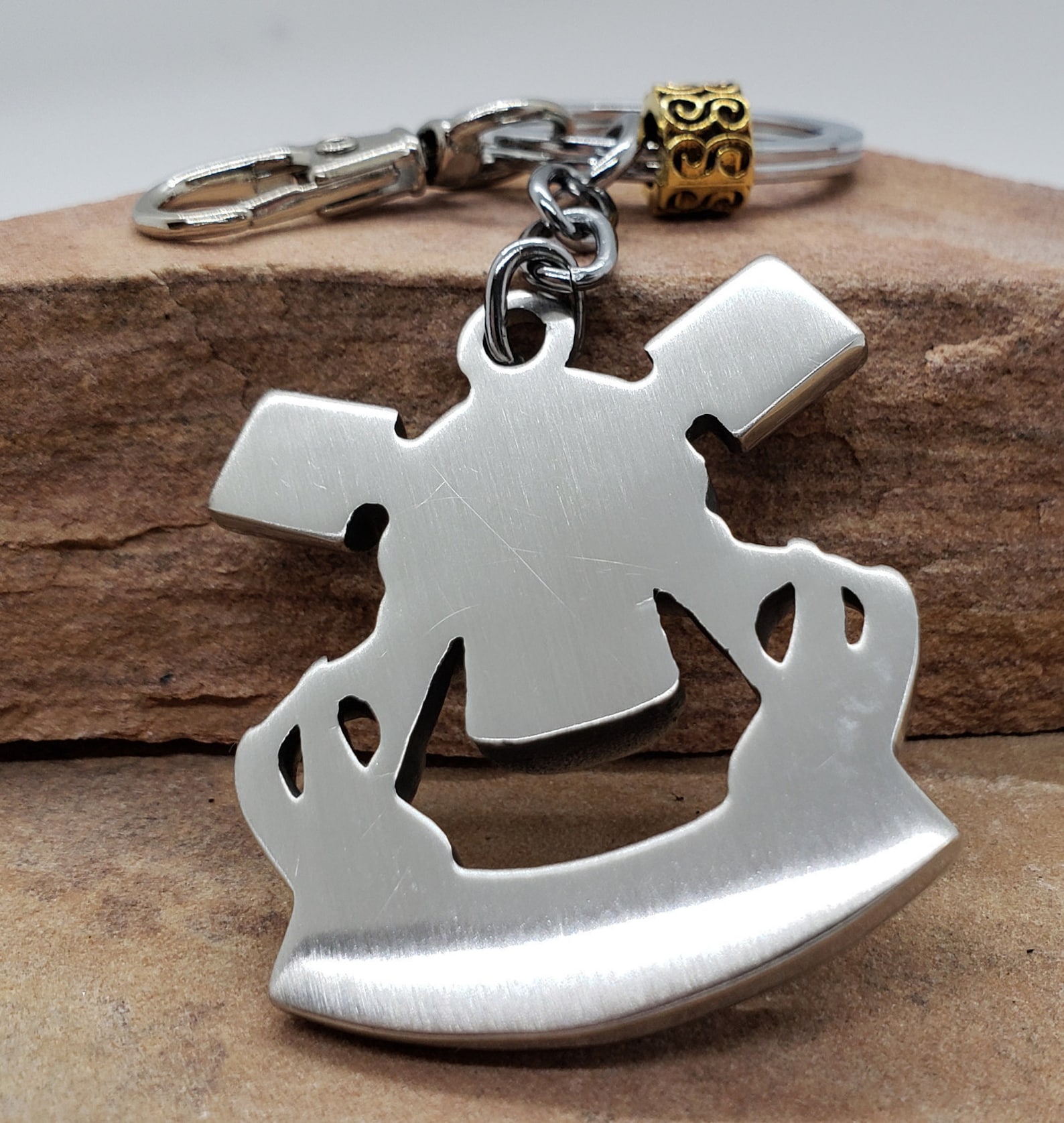 piston art skull keychain