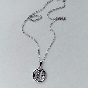Silver spiral star necklace Indie whimsigoth jewelry Spiral galaxy Swirl vortex pendant Falling star Polar star Gothic necklace Y2k Grunge