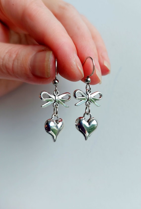 TATIANA☆[SILVER925] One Side Heart Bow Earring Designer fashion, Seoul-fully created | W Concept