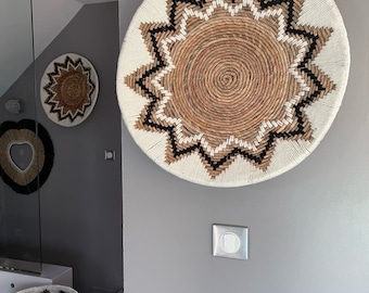 Braided wall decoration in banana leaves entirely embroidered with black and black wool - diameter 50 cm - Awa model