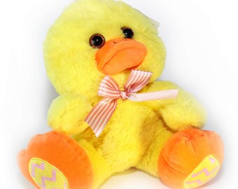 stuffed duck holding knife