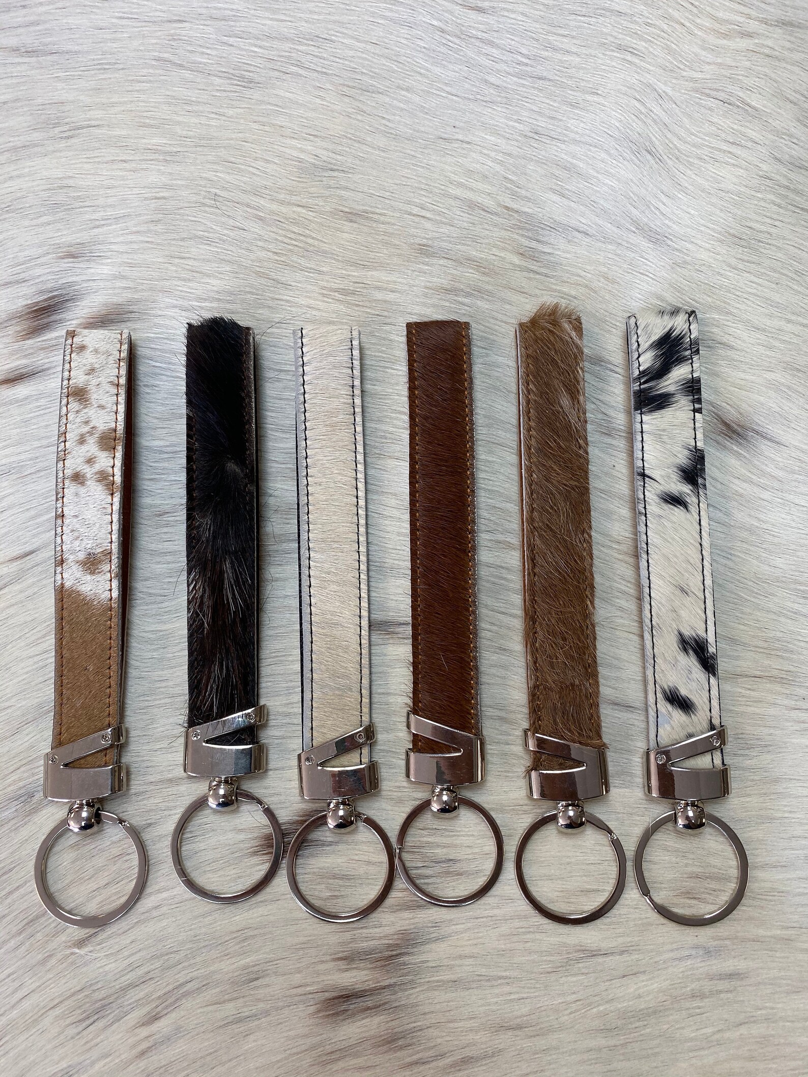 100 Brazilian Cowhide keychain with leather backing. Etsy