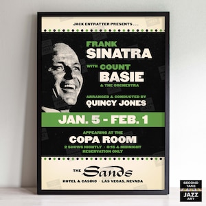 May include: A vintage concert poster advertising a performance by Frank Sinatra with Count Basie and his orchestra. The poster features a black and white photo of Frank Sinatra, with the text "Frank Sinatra with Count Basie & The Orchestra" in white lettering on a black background. The poster also includes the text "Arranged & Conducted by Quincy Jones" and "Jan. 5 - Feb. 1" in green lettering on a black background. The poster advertises the performance as taking place at the Copa Room at The Sands Hotel & Casino in Las Vegas, Nevada.