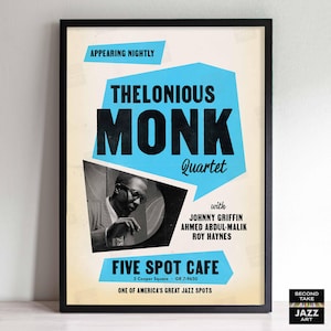 May include: A framed vintage poster for Thelonious Monk Quartet, featuring a black and white photo of Monk. The poster has a light blue geometric design with the text "THELONIOUS MONK Quartet" and "FIVE SPOT CAFE". The poster is framed in black.