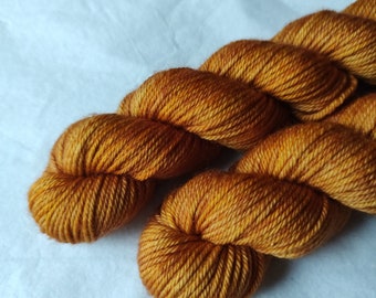 Golds on superwash merino worsted/dk yarn