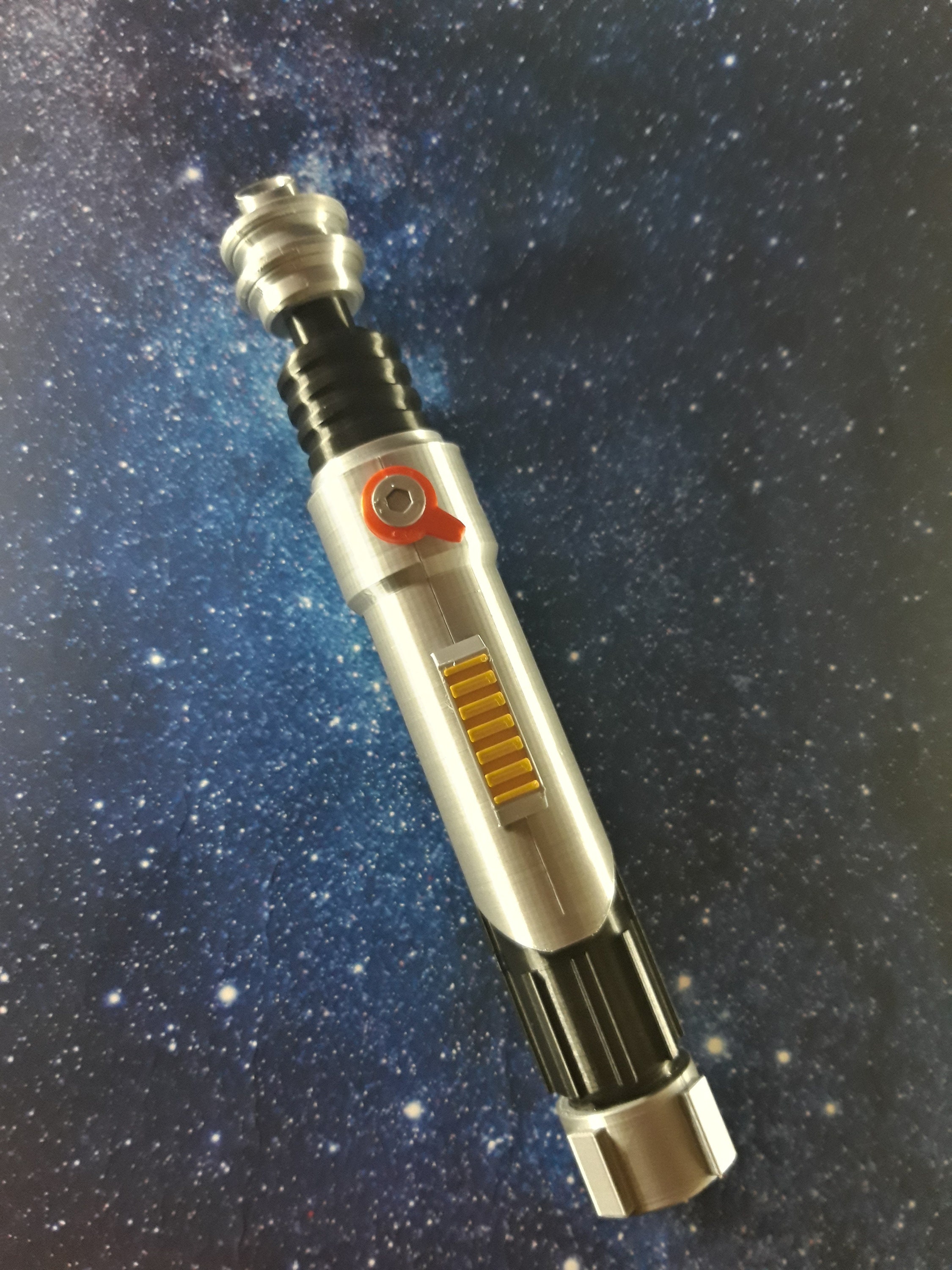 Ezra Bridger's Lightsaber Hilt & Stand Rebels 3d printed