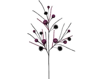 May include: A decorative stem featuring dark purple berries and black, fuzzy accents. The stem has thin, dark gray branches with touches of pink. The berries are round and smooth, creating a striking contrast against the textured accents.