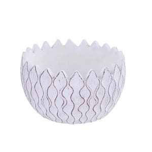 May include: White, round decorative bowl with a textured, distressed finish. The bowl has a scalloped rim and vertical, wavy lines. The interior is smooth and white. This bowl is suitable for home decor.