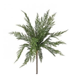 May include: A single artificial cedar branch featuring a central brown stem with multiple radiating green needle-like foliage sprays. The evergreen sprig displays a dense, textured arrangement of pointed, scale-like leaves extending outward in a star-like pattern from the main stalk.