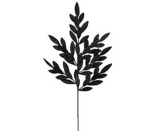 May include: A single, artificial black leaf stem against a white background. The stem is a dark brown color, and the leaves are a matte black. The leaves are small and oval-shaped, arranged in a symmetrical pattern along the stem.
