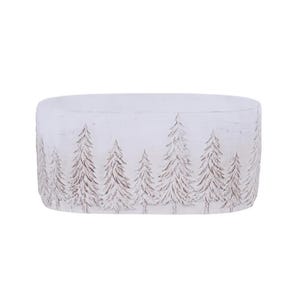 May include: A white, oval-shaped decorative container with a textured surface. The container is adorned with a repeating pattern of brown fir trees. The design gives a rustic, wintery feel. The container is suitable for holding small items.