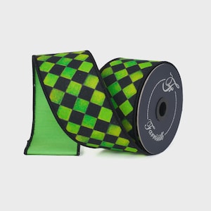 May include: A roll of decorative ribbon with a black and green checkered pattern. The ribbon is rolled up, revealing a bright green underside. The spool is dark gray with the text "Farrisilk".