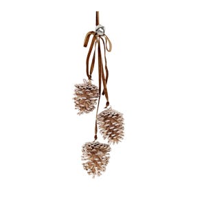May include: A hanging decorative ornament featuring three natural brown pinecones suspended from a brown velvet ribbon. The ribbon is tied in a bow at the top and includes a small silver-toned metal bell attached to the center of the knot.