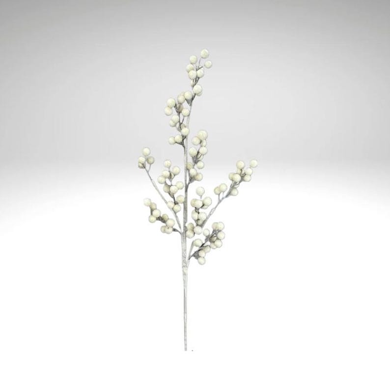 May include: A single artificial stem with off-white berries. The stem is a light gray color, and the berries are clustered along the branches. The berries are round and have a slightly textured appearance. The background is a solid white.