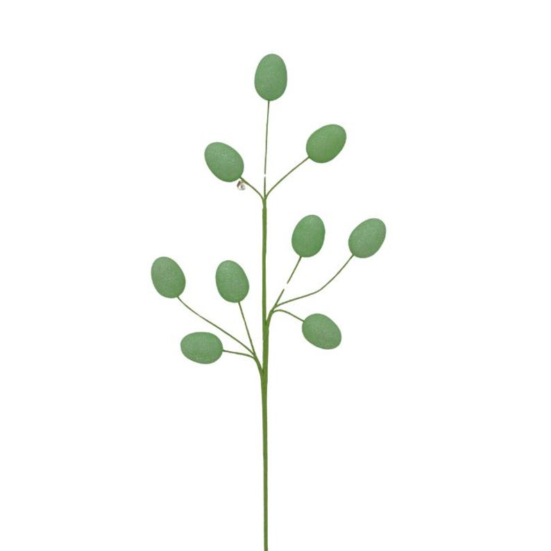 May include: A single stem of green artificial foliage with multiple oval-shaped leaves.
