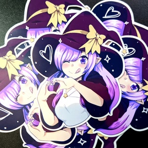 May include: A set of four stickers featuring a purple-haired witch with a purple and gold hat. The witch is making a heart shape with her hands. The stickers have a sparkly background with stars and hearts.
