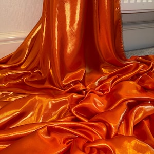 1 Meter Shiny Orange/Gold Soft Wet Look Shimmer Satin Fabric 58” Wide