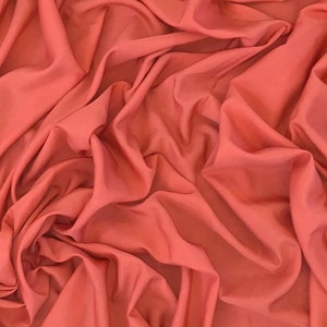 1 Meter Coral Peach 100% Polyester Lining Plain Quality Fabric Soft Light Weight 45 inches Wide Matt.