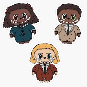 May include: Three cartoon stickers featuring stylized creatures with large eyes and sharp teeth. One has dark hair with red bows in a blue sailor outfit, one has short dark hair in a tan suit, and one has blonde hair in a brown suit with ties.