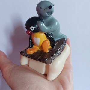 Pingu with seal on 1990s toy collectors item