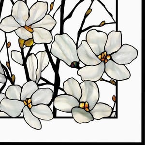 May include: A stained glass window design featuring white magnolia blossoms with yellow centers. The flowers are arranged on black branches against a white background.