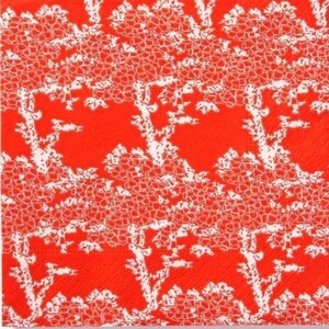 May include: Red and white patterned fabric with a floral design. The fabric has a repeating pattern of white flowers on a red background.