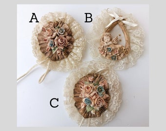 Vintage Italian wall hanging shabby chic style decoration, old ceramic roses newborn party lace and ribbons elements cream color home decor