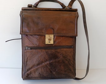 The men's handbag with many departments and pockets, vintage brown branded "Marianelli", bag in leather made in Italy 70s in good condition