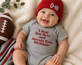 Ohio State Baby Bodysuit | I Just Got Here and Already Hate Michigan | Funny Football Baby Bodysuit | Buckeye Baby Gift