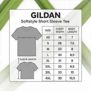 May include: A size chart for Gildan Softstyle short sleeve tees. The chart shows chest width and body length measurements in inches for sizes XS to 4XL. The image includes a diagram of a t-shirt with arrows indicating chest width and sleeve length.