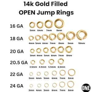 May include: A white background displays multiple sizes of 14k gold-filled open jump rings. The sizes range from 3mm to 10mm, with gauge sizes from 16 GA to 24 GA. The text "14k Gold Filled OPEN Jump Rings" is at the top.