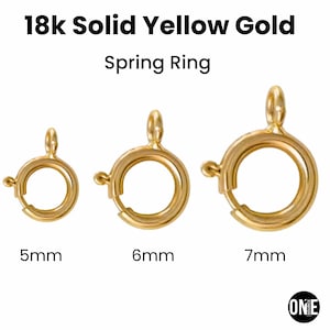 May include: Three 18k solid yellow gold spring ring clasps arranged by size. The text reads 18k Solid Yellow Gold Spring Ring with labels for 5mm, 6mm, and 7mm sizes. Each circular clasp features a small lever and a top loop for jewelry attachment.