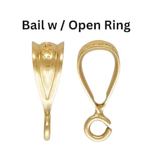 Puede incluir: Biela de oro con un anillo abierto. La biela está diseñada para sujetar un colgante o un amuleto a una cadena o collar.