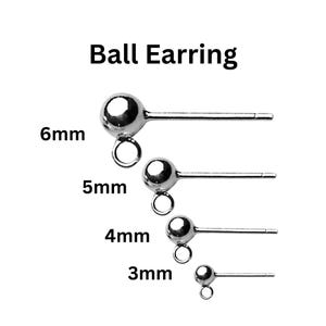 May include: A set of four silver ball earring posts in sizes 3mm, 4mm, 5mm, and 6mm.