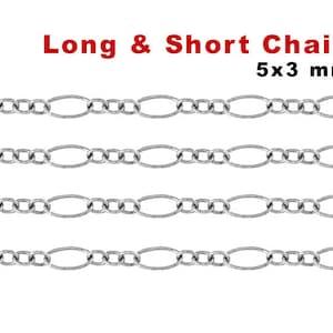 May include: Four rows of silver chain, each with oval links. The chain is 5mm wide and 3mm thick. The text "Long & Short Chain 5x3 mm" is above the chain.