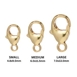 May include: Three gold lobster claw clasps in different sizes: small (4.8x9.0mm), medium (6.0x11.5mm), and large (7.0x13.0mm).