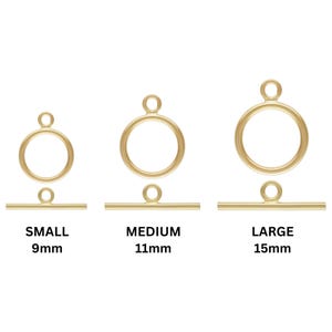 May include: Three gold-toned metal toggle clasps in different sizes: small (9mm), medium (11mm), and large (15mm).