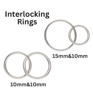 May include: Two sets of interlocking metal rings. The top set is a 15mm ring and a 10mm ring. The bottom set is two 10mm rings.