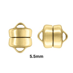 May include: Two gold-colored magnetic clasps, each with a rounded rectangular shape and a loop on each end. One clasp is closed, and the other is open, showing the magnetic connection. The text "5.5mm" is below the clasps.