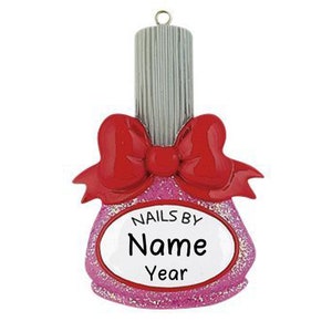 May include: Pink and red nail polish bottle Christmas ornament with a white oval label that says "Nails By Name Year".